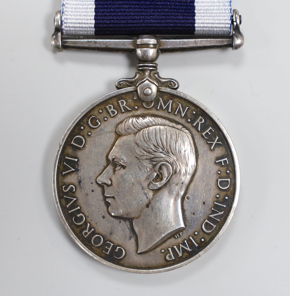 A Royal Navy Long Service and Good Conduct medal to k.62909 DRAGE STO.1. HMS COURAGEOUS, George VI issue